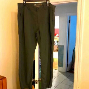 REI nylon green long pants.  Open side pockets and zippered pocket on leg.